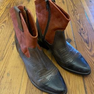 Totally awesome brown  and orange cowboy booties. So cool